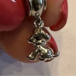 silver Pandora- style bead shaped as a puppy!
